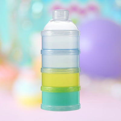 Vue verticale de la boite doseuse lait avec ses quatre compartiments colorés empilés, illustrant sa structure compacte et modulaire.