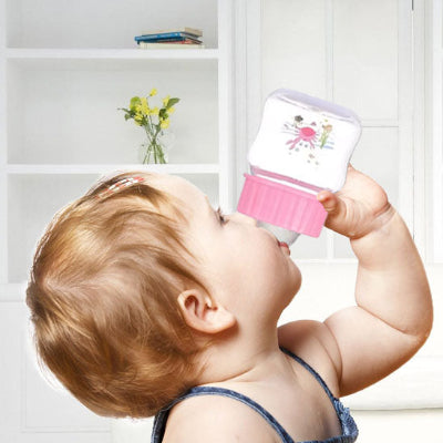 Biberon anti-colique mini avec tétine souple, conçu pour le confort du bébé et une meilleure digestion, facile à nettoyer et à remplir.