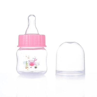 Biberon anti-colique mini rose, avec tétine en silicone souple pour une alimentation naturelle et apaisante. Idéal pour les premiers mois de bébé.