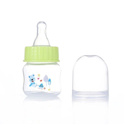 Biberon anti-colique mini vert, idéal pour nourrir bébé sans gaz ni coliques. Conception ergonomique et tétine douce pour une transition facile.