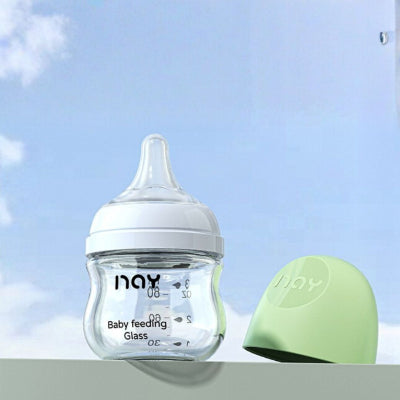 Biberon naissance en verre 80 ml avec tétine physiologique et capuchon vert, idéal pour nouveau-né de 0 à 6 mois