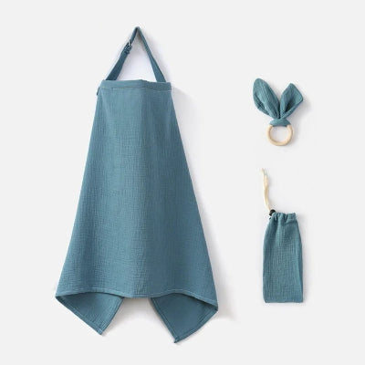 Cape d’allaitement bleu gris en coton respirant avec accessoires assortis, offrant confort et discrétion en toute circonstance.