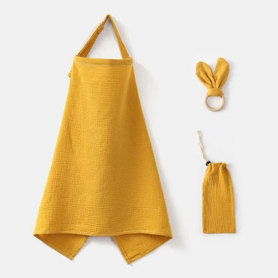 Cape d’allaitement moutarde vive avec accessoires assortis, conçue pour préserver l’intimité de la maman tout en apportant une touche stylée.