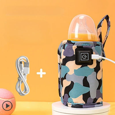 chauffe biberon nomade coloris camouflage noir et turquoise avec cordon USB de 100 cm inclus, bouton tactile et boucle de suspension, compatible avec la plupart des biberons