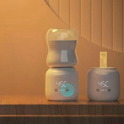 Chauffe biberon sans fil avec double affichage numérique de température, design élégant et minimaliste adapté aux besoins des parents modernes en mobilité.