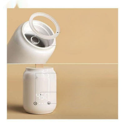 Chauffe biberon sans fil avec couvercle amovible, système de sécurité alimentaire, et écran LED tactile pour sélectionner la température idéale pour le lait de bébé.
