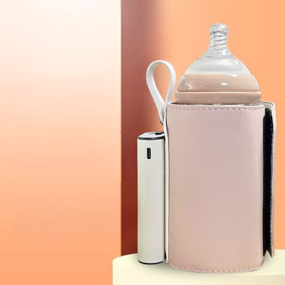 Chauffe biberon sans fil rose en cuir PU avec système de fixation réglable et batterie intégrée, idéal pour les sorties avec bébé.