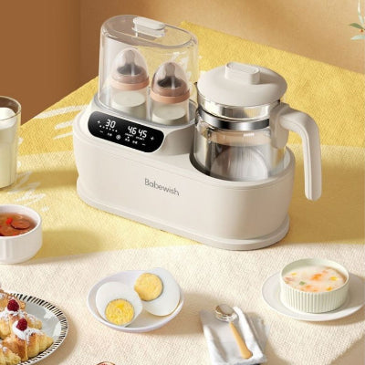 Chauffe biberon multifonction utilisé à table pour chauffer du lait, stériliser les biberons et réchauffer les repas de bébé. Conception élégante et compacte, parfaite pour les familles modernes.