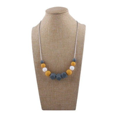Collier d’allaitement aux perles jaunes et blanches en silicone alimentaire, monté sur fil sécuritaire, idéal pour la dentition de bébé