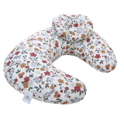 Coussin d’allaitement motif floral aux couleurs automnales sur fond crème, idéal comme coussin de positionnement pour bébé et soutien pendant l’allaitement.