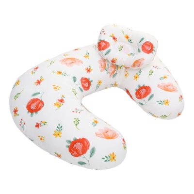 Coussin d’allaitement blanc décoré de fleurs rouges et orange, avec têtière intégrée, conçu pour soulager les tensions et améliorer la position de l’enfant.