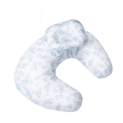 Coussin d’allaitement blanc à motifs feuilles bleues, avec oreiller intégré pour bébé. Favorise une bonne position d’allaitement et le confort post-partum