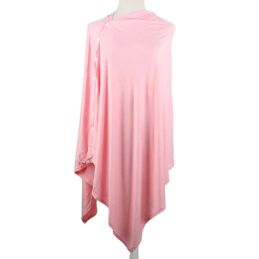 DouceEnvol™ rose poudré sur mannequin — poncho allaitement coupe fluide, boutons-pression blancs