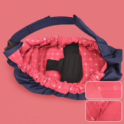 Variante écharpe de portage allaitement NursingSling avec intérieur rose à carreaux, bandoulière ajustable et confort maman bébé.