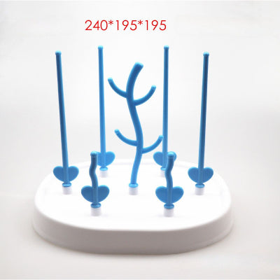 Egouttoir biberon bleu ciel de dimensions 24x19,5x19,5 cm, design compact avec tiges en hauteur assurant un séchage rapide et une hygiène optimale pour les accessoires bébé.