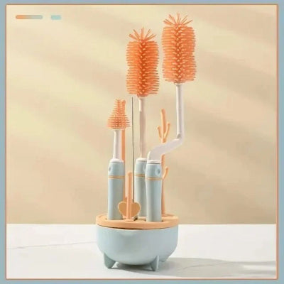 Kit goupillon biberon bleu mousse avec brosses en silicone et base gain de place, idéal pour nettoyer efficacement les biberons et pailles.