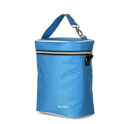 Sac isotherme Bebe bleu compact Insular avec revêtement hexagonal, fermeture zippée renforcée et anse de transport solide pour garder les biberons à température.