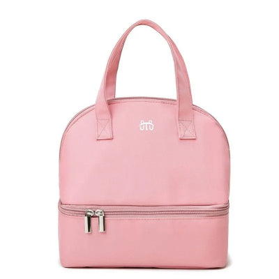 Sac repas bébé isotherme rose clair, parfait pour les jeunes mamans souhaitant garder les biberons frais ou chauds.