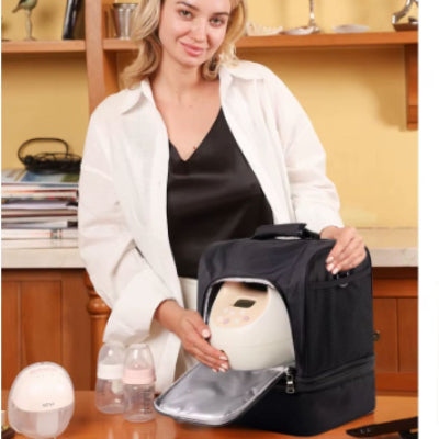 présentation du sac isotherme Bebe au bureau, rangement supérieur avec tire-lait et compatibilité parfaite pour les mamans actives
