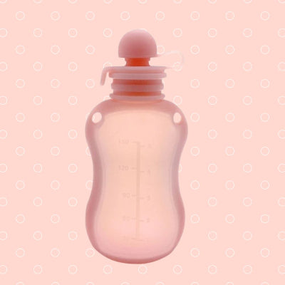 Sachet conservation lait maternel rose en silicone alimentaire, réutilisable, souple et parfait pour l’allaitement à la maison ou en crèche.