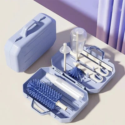 Modèle bleu du sèche biberon DryMimi™ avec support intérieur amovible, idéal pour les voyages ou les petits espaces de cuisine.