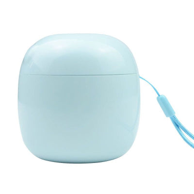 stérilisateur tétine compact à lumière LED UV-C, blanc, présenté en vue de dessus, fermé et prêt à l’usage.