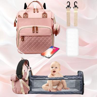 Sac à dos à langer BabyNest™ Soft Blush - Une teinte douce et féminine en rose poudré, idéale pour les mamans qui souhaitent associer élégance et praticité.