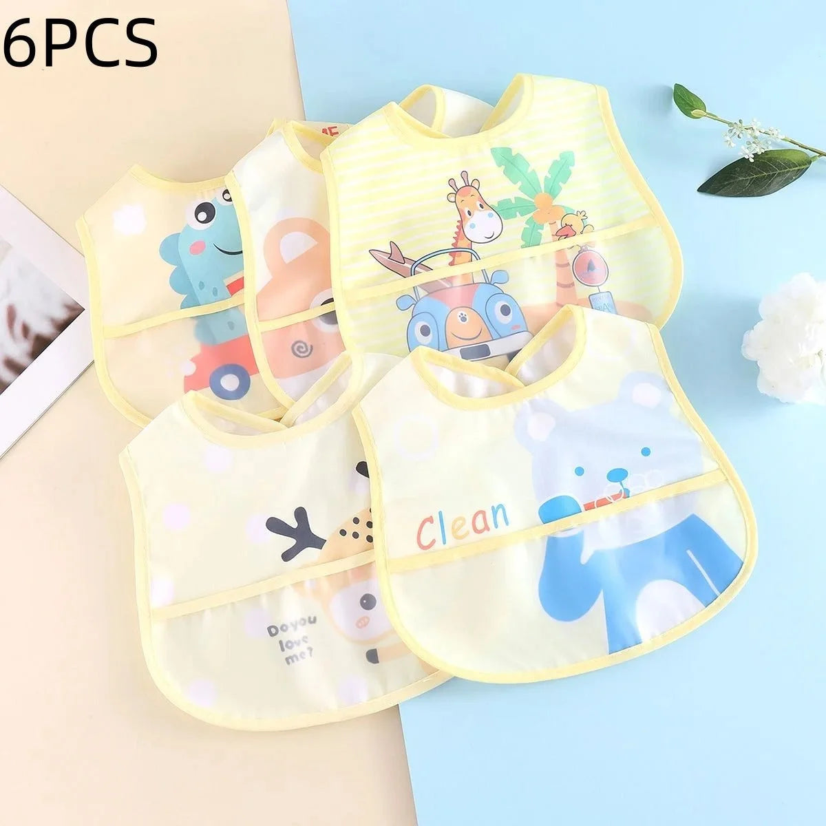 Bavoir bébé imperméable - détail accessoires | Premiers Pas Sereins