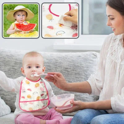 Maman nourrit son bébé avec un bavoir imperméable motif fruits pour repas sans taches