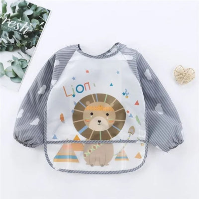 Bavoir bébé manche longue BabyStyle™ motif lion, tablier bébé repas imperméable avec récupérateur intégré, blouse pratique de 6 mois à 3 ans.
