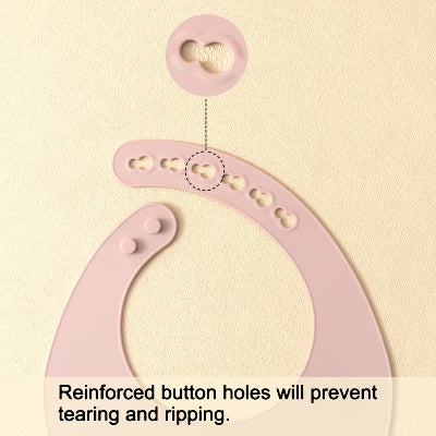 Détail du système de réglage du bavoir bébé en silicone PocketDuo avec boutons renforcés