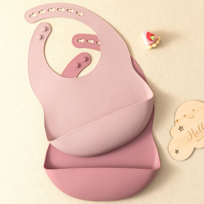Bavoir bébé en silicone imperméable PocketDuo avec grande poche récupératrice couleur rose