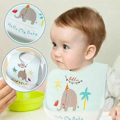 Bavoir silicone imperméable MiniMiam TrioBib avec motif éléphant pendant le repas de bébé