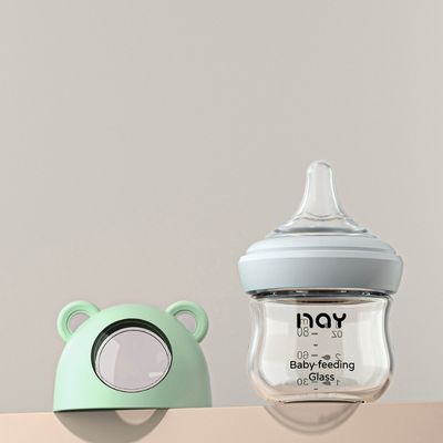 Biberon pour allaitement en verre incassable vert 80 ml avec tétine physiologique