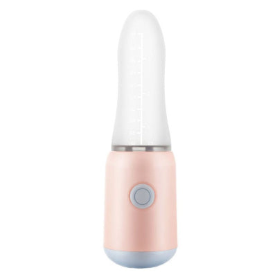 Vue frontale du biberon cuillère Cuillimix™ avec embout en silicone alimentaire gradué.