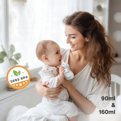 Maman nourrissant son bébé avec un biberon en verre sans BPA, offrant sécurité et confort pendant la tétée.