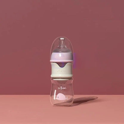 Biberon en verre 150 ml rose pour nouveau-né, alliant sécurité et douceur dès les premières tétées.