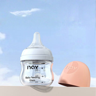 Biberon naissance en verre 80 ml avec tétine physiologique et capuchon rose, transition douce entre sein et biberon