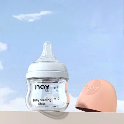Biberon naissance en verre 80 ml avec tétine physiologique et capuchon rose, transition douce entre sein et biberon