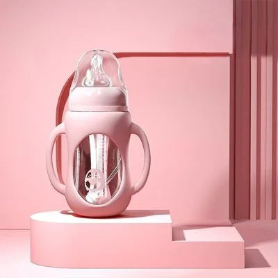 Biberon en verre rose 240 ml avec poignée ergonomique et protection silicone antichute