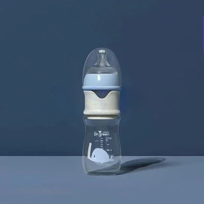 Biberon en verre 240 ml bleu avec tétine M pour bébé de plus de 3 mois – Design ergonomique et verre transparent sécurisé.