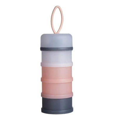 Boite doseuse lait rose et gris DosiLait™ avec 4 compartiments hermétiques pour doser et stocker du lait en poudre, céréales ou en-cas bébé.