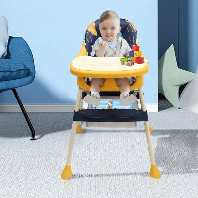 Bébé assis dans une chaise haute évolutive coloris jaune et bleu, jouant avec des blocs éducatifs sur le plateau double fonction, chaise haute bébé stable et confortable pour l’apprentissage.