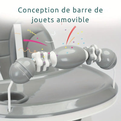 Coussin Allaitement pour Bébé installé sur une chaise haute évolutive avec barre de jouets amovible pour stimuler l’éveil.