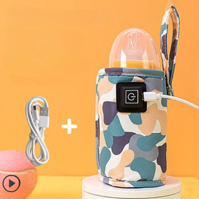chauffe biberon nomade style camouflage beige et vert avec alimentation USB incluse, convient aux biberons standards, solution portable pour le lait de bébé