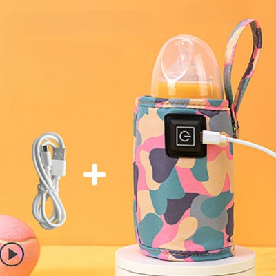 chauffe biberon nomade rose multicolore avec alimentation USB, tissu isolant doux et coloré, compatible avec biberons en verre ou plastique pour un usage nomade