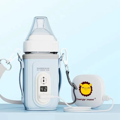 Chauffe-biberon nomade connecté à une alimentation via câble USB Type-C avec affichage LCD, idéal pour le lait maternel.
