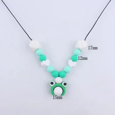 Collier d’allaitement grenouille avec détails de dimensions des perles en silicone, soulagement dentaire et sécurité garantie.