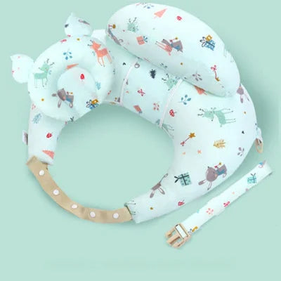 Coussin allaitement avec oreiller pour bébé et ceinture réglable, motif faon et lapin sur fond vert menthe, conçu pour soutenir la maman et maintenir bébé dans une position idéale pendant la tétée.

