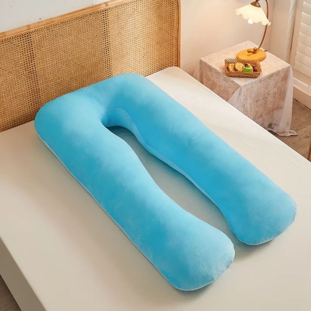 Coussin de grossesse en forme de U, de couleur bleue, idéal pour soulager les douleurs pendant la grossesse.